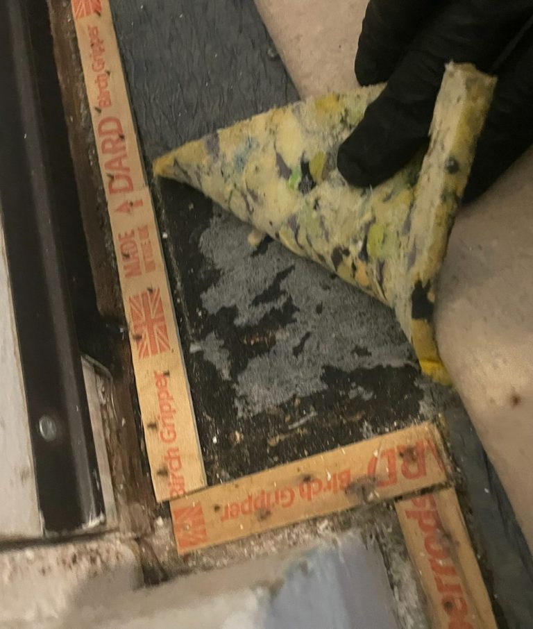 Bitumen floor containing asbestos in Mansfield commercial property